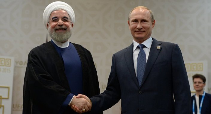 Presidente de Iran Hasan Rouhani y presidente de Rusia Vladimir Putin