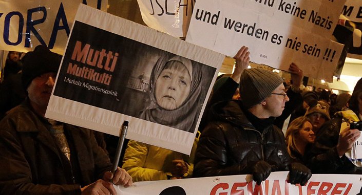 Manifestacion en contra de la politica migratoria de Angela Merkel